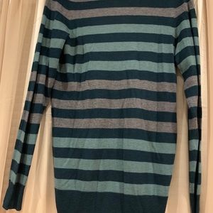 Sweater. Very light & comfortable.